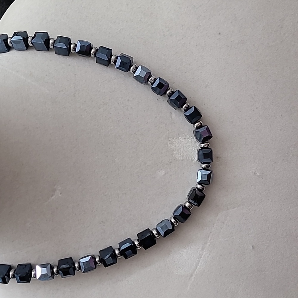 Hand crafted 21 inch necklace made of blue glass cubed beads and hematite spacer